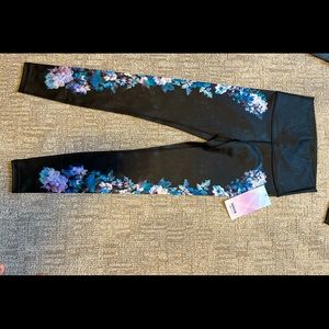 Ivivva, NWT, size 12, black leggings with blue flower accents
